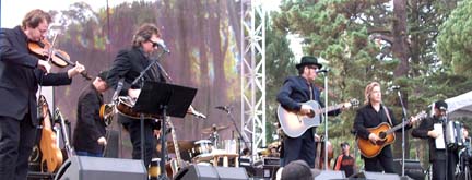 Elvis Costello (with hat) and his band. [Photo by Grace Sankey-Berman]
