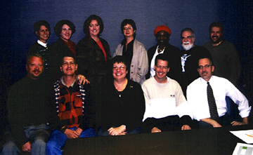 TPAC and BMF meet. Front row (from left) John Esau, development director; Mike Woodruff, operations assistant; Melanie Kitchner, marketing manager; Rob Seitz, executive director; Mark Radziejeski, assistant director. Back row (from left) Sarah Kratzer, finance manager; April Evans, box office manager; Pamela Hatfield, executive assistant; Christy Bien, receptionist; Grace Sankey Berman; Butch Berman; Tony Rager [Photo by Rich Hoover]