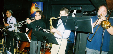 Horn players are (from left) Charles Perkins, Stan Kessler, David Chael and Paul McKee. [Photo by Tom Ineck]
