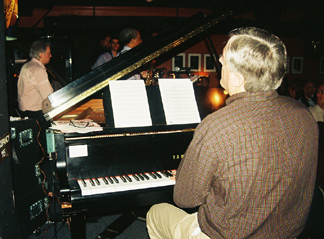 Gerald Spaits (left) plays bass as Paul Smith commandeers piano. [Photo by Tom Ineck]