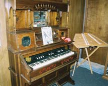 Among the instruments acquired on a consignment basis is this antique organ. [Photo by Tom Ineck]
