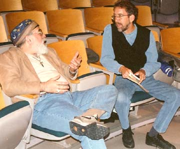 Butch and Tom Ineck chatting after a performance by Valerie Capers at Doane College in Crete