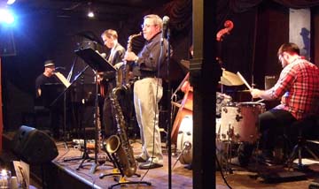 Jim Stranahan (on sax) leads a group also featuring Jeff Jenkins, piano; Mike Abbott, guitar; and Colin Stranahan, drums. [Photo by Tom Ineck]