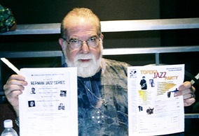 Butch Berman with flyers for Berman Jazz Series and 2005 Topeka Jazz Festival [Photo by Tony Rager]
