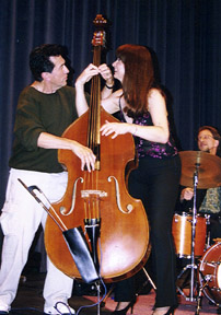 Bassists Jim DeJulio and Jennifer "Lefty" Leitham fool around. [Photo by Tom Ineck]