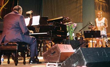 Pianist Mulgrew Miller interacts with Bridgewater. [Photo by Tom Ineck]